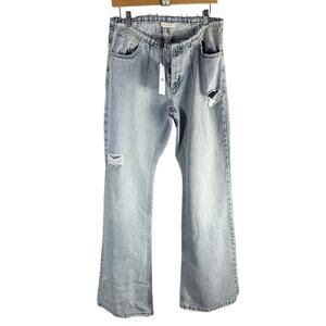 The MANNEI Low Rise Distressed Frayed Wide Leg Jeans
FR 40 Button Fly